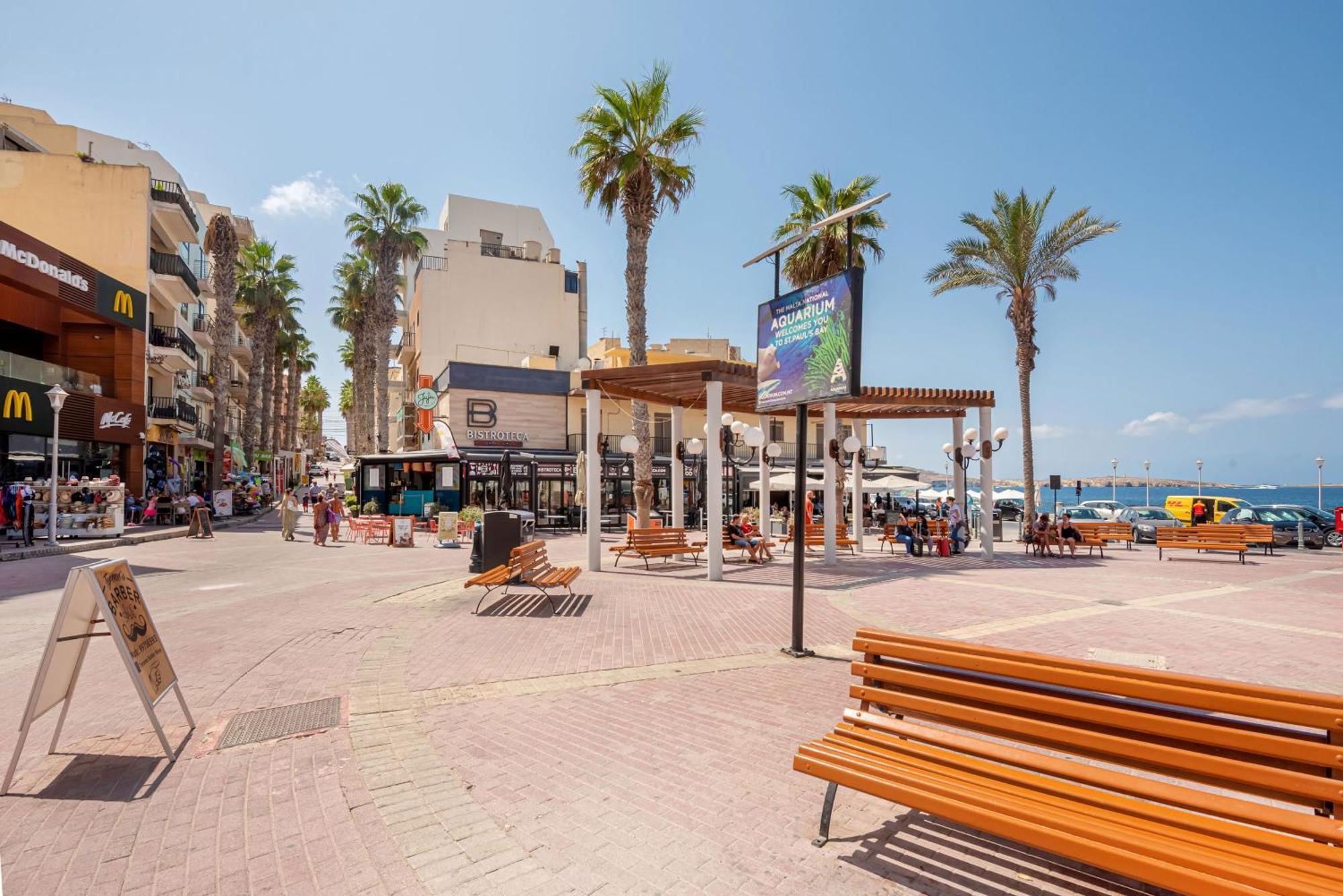 Islet Promenade Seafront With Large Corner Terrace By Getawaysmalta