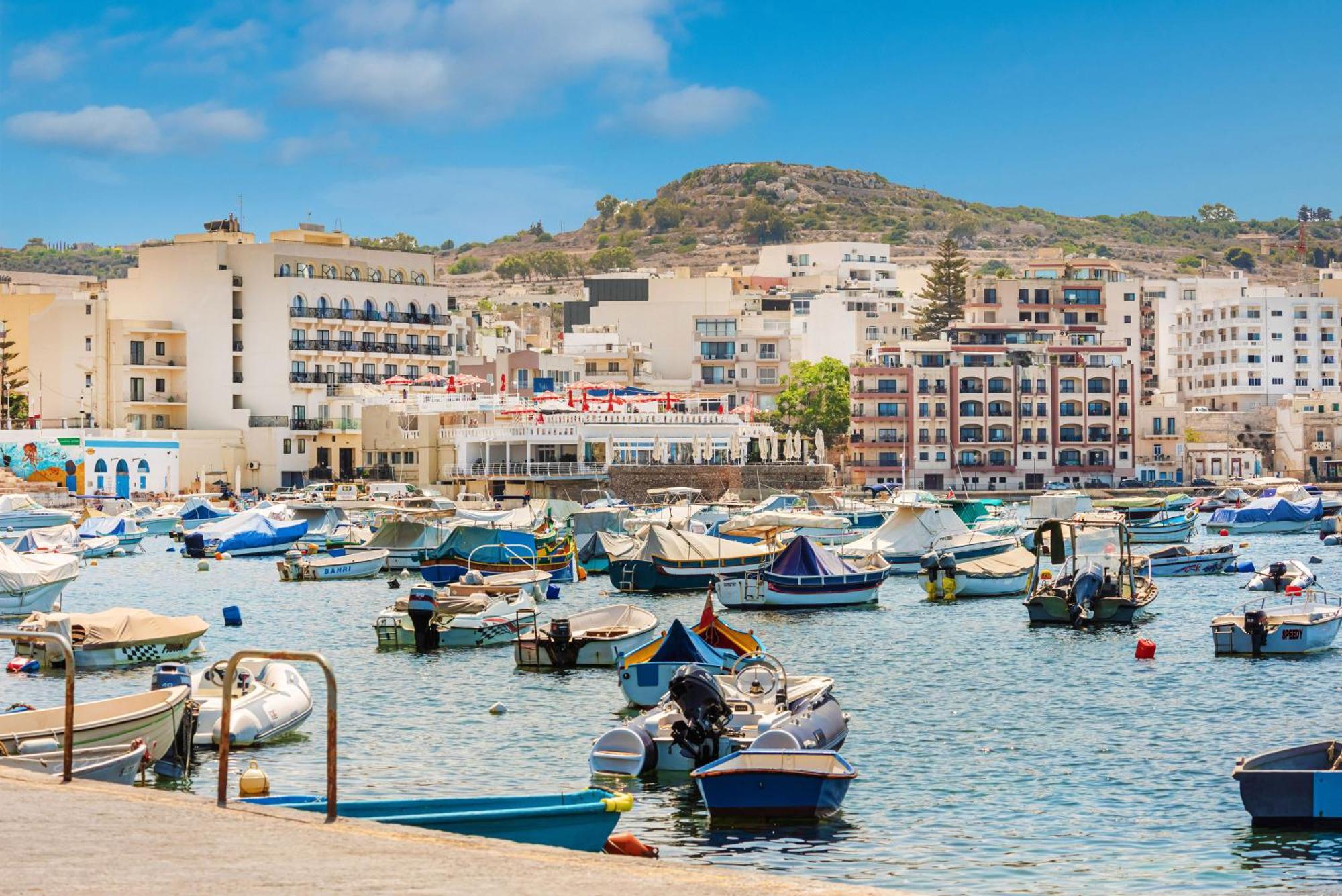 Islet Promenade Seafront With Large Corner Terrace By Getawaysmalta *