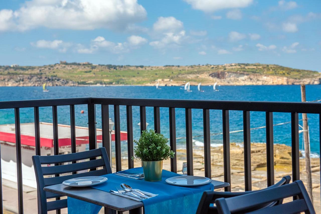 Islet Promenade Seafront With Large Corner Terrace By Getawaysmalta