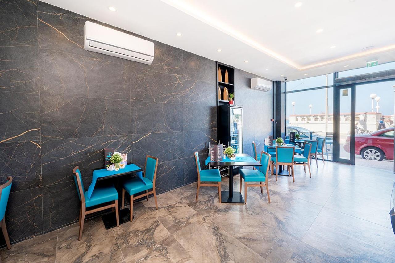 Islet Promenade Seafront With Large Corner Terrace By Getawaysmalta Appartement