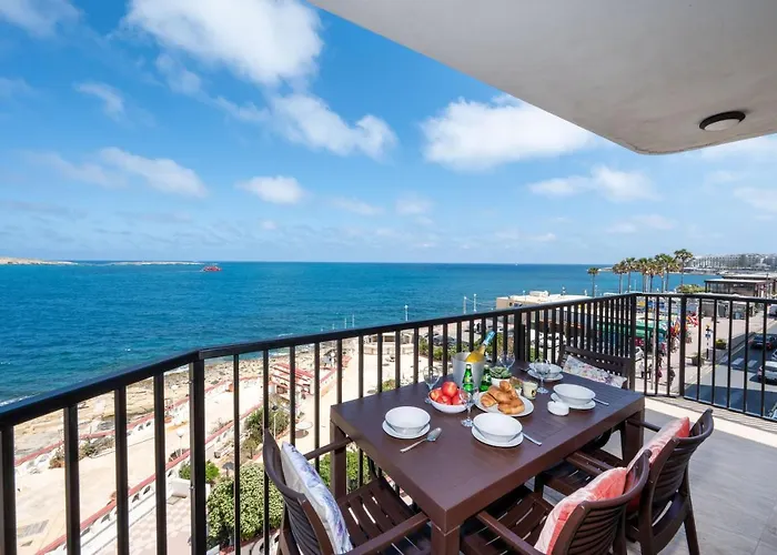 Islet Promenade Seafront Apartment With Large Corner Terrace By Getawaysmalta